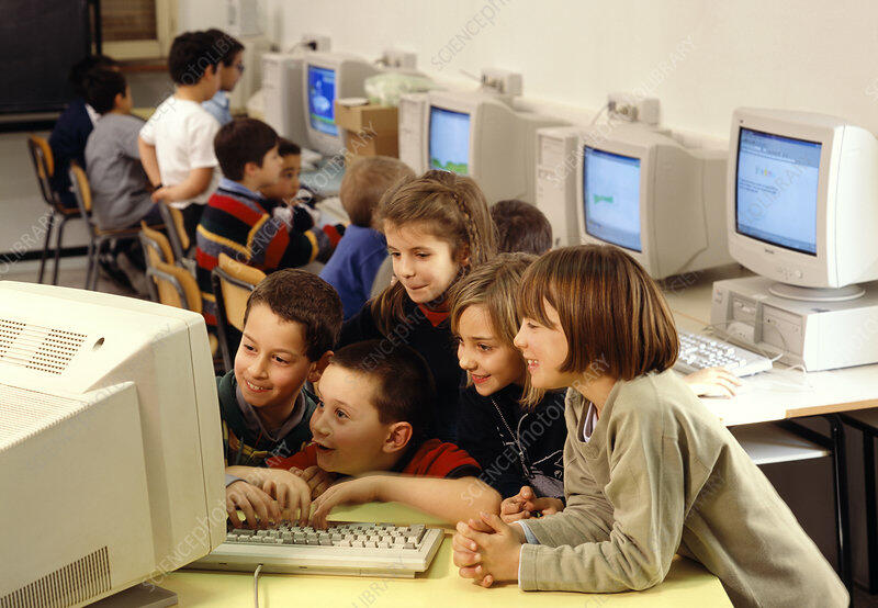 Computing lesson - Stock Image - H460/0325 - Science Photo Library