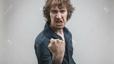 Angry Man Trying To Intimidate You With A Gross Menace With His Punch Stock Photo, Picture And Royalty Free Image. Image 84205346.